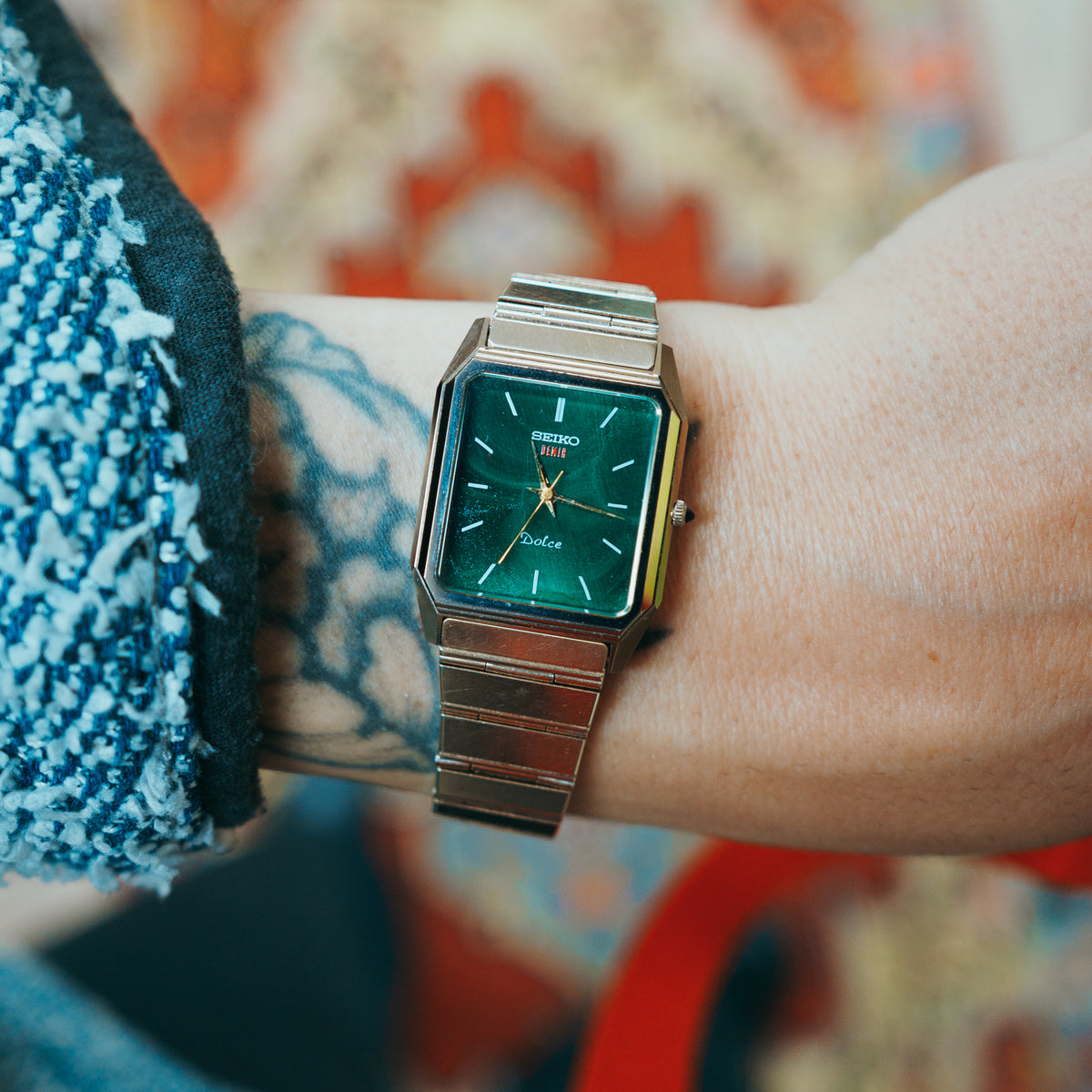 Seiko Dolce Coffee Malachite - green malachite dial with gold hands on wrist