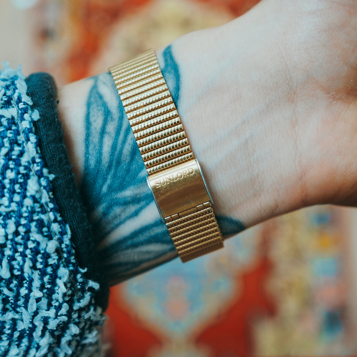 Sunlord Quartz - gold expansion bracelet with Sunlord clasp stamping on wrist