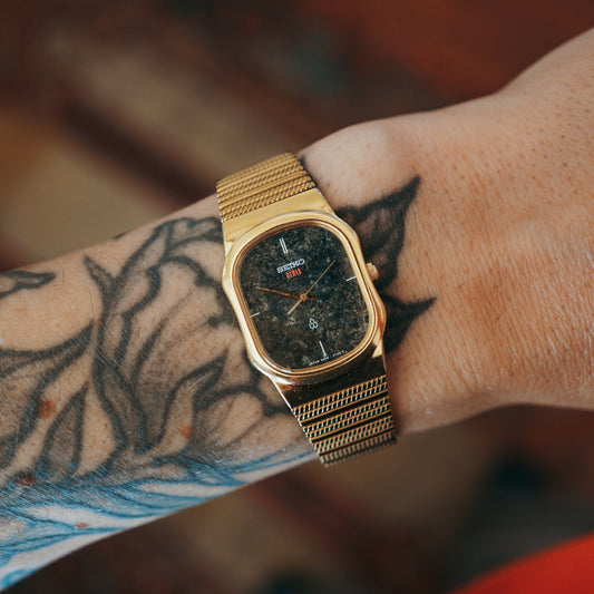 Seiko Quartz Larvikite - gold dial wrist shot
