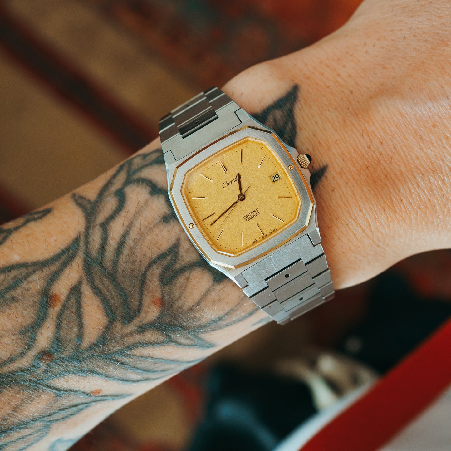 Orient Chandor Quartz champagne dial front view on wrist