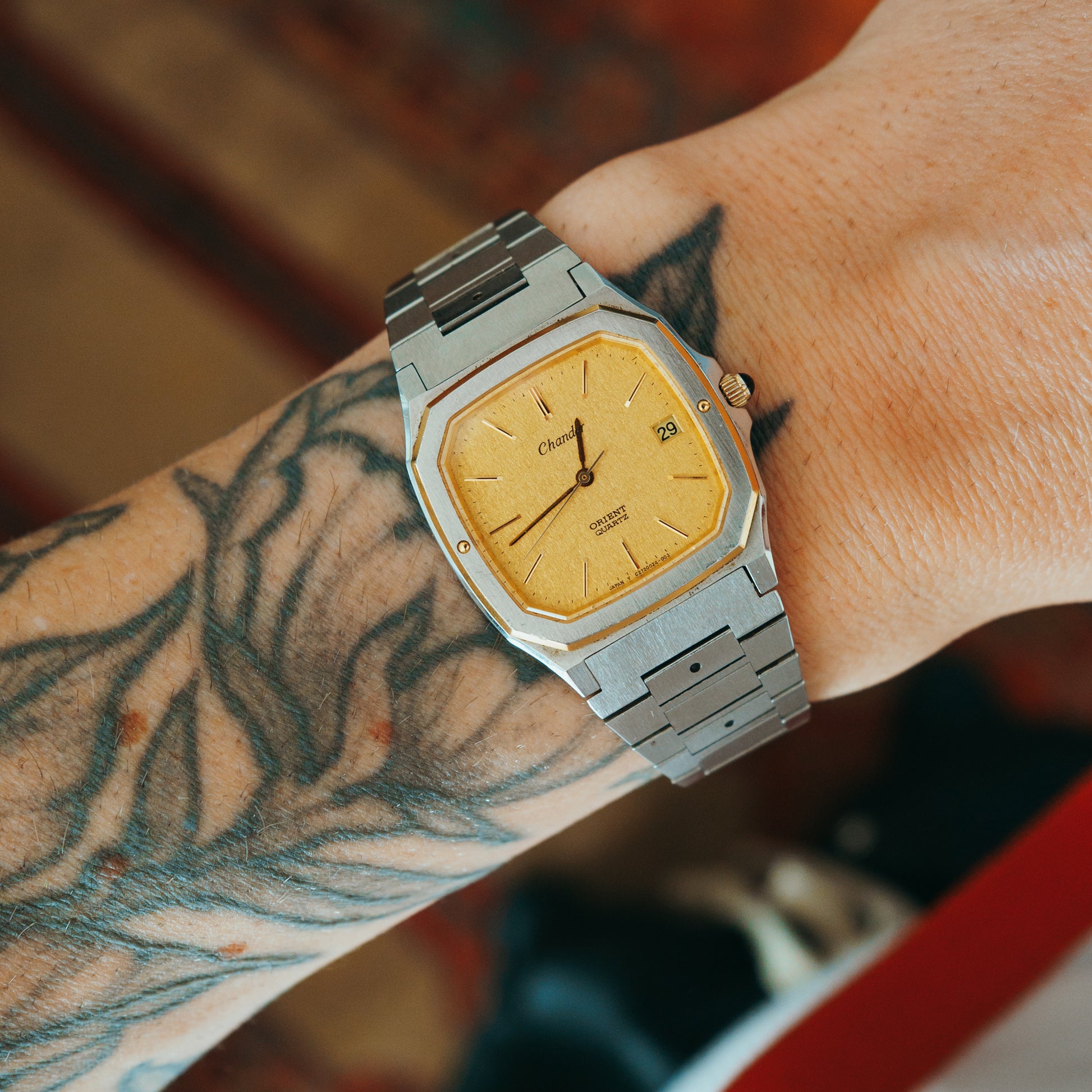 Orient Chandor Quartz champagne dial front view on wrist