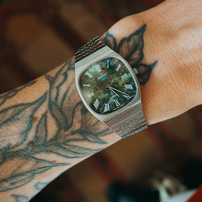 Seiko Emblem serpentine dial front view on wrist