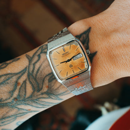 Seiko King Quartz tropic dial amber patina front view on wrist