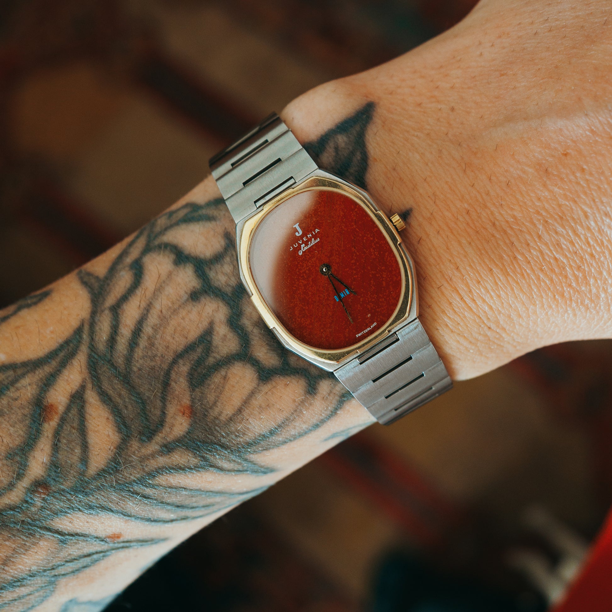 Juvenia Quartz red garnet custom dial front view on wrist