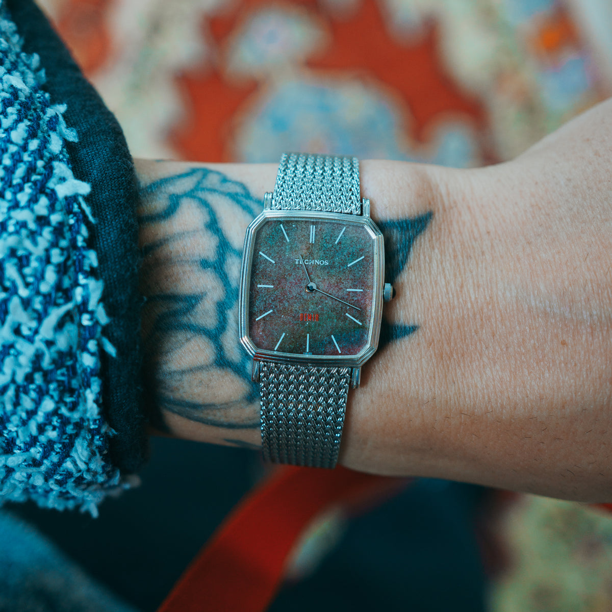 Technos Rainbow Stone - rectangular case with mottled stone dial on wrist