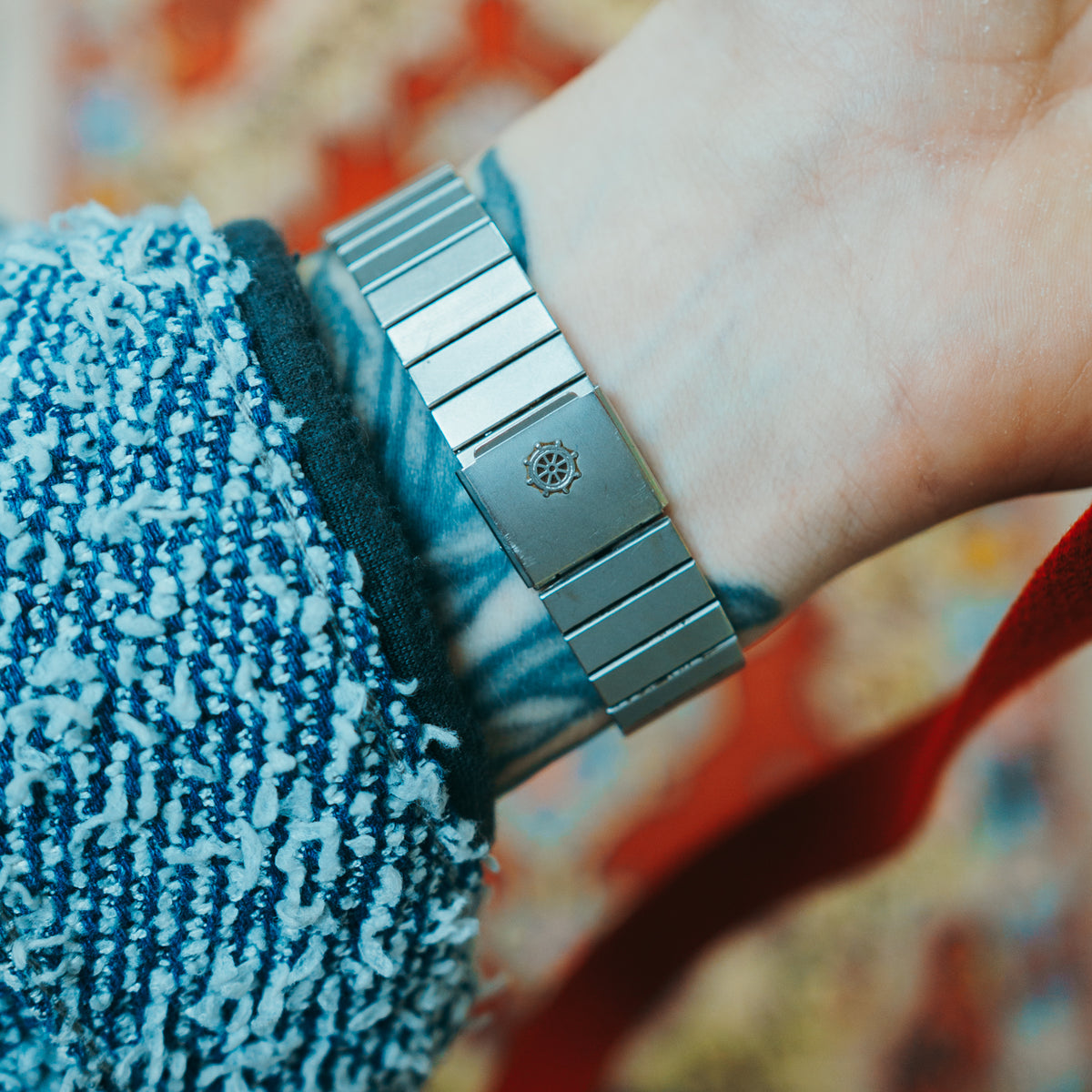 LeRoy x Baume & Mercier - steel bracelet with ship's wheel clasp stamp on wrist