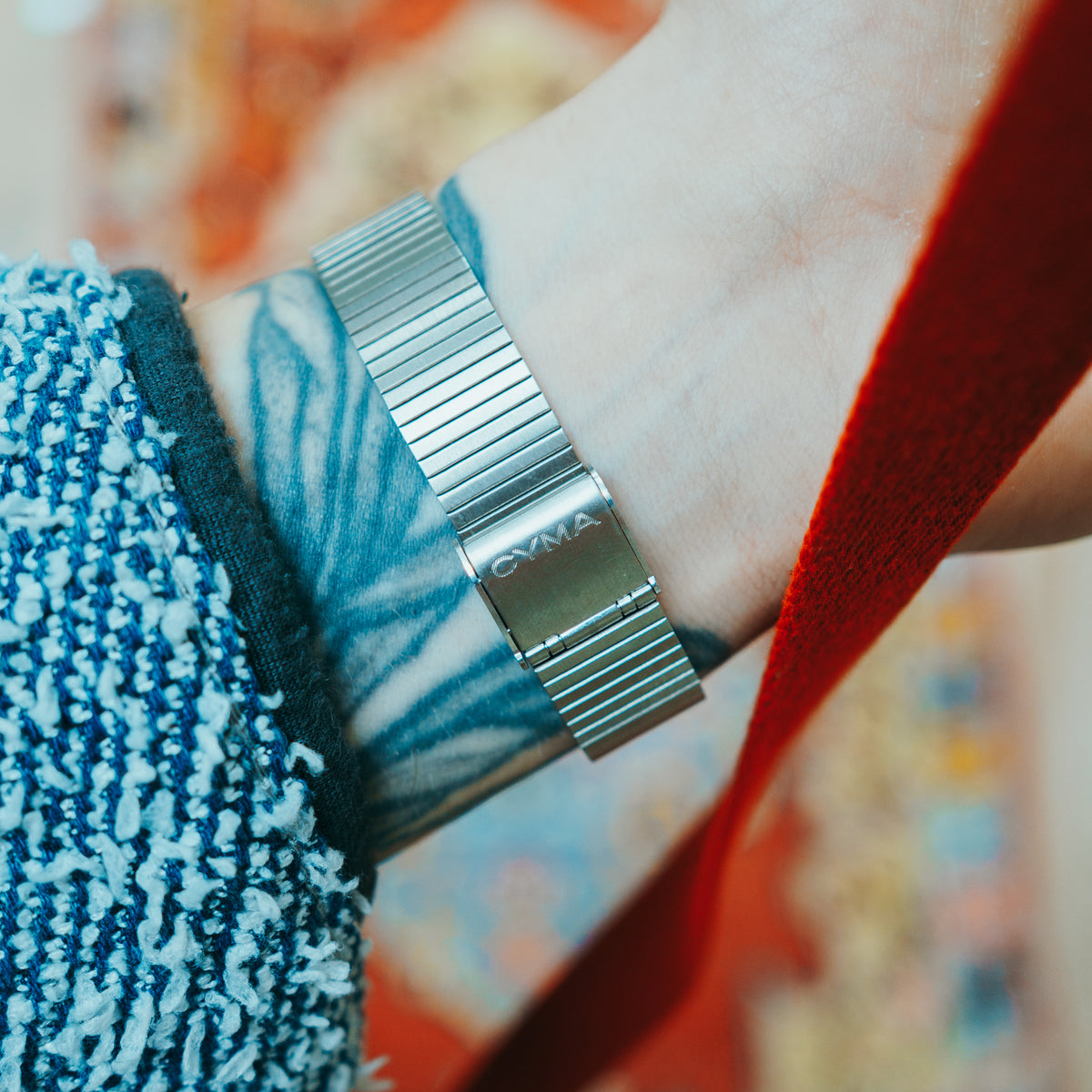 CYMA Blue Lapis - steel expansion bracelet with CYMA clasp on wrist