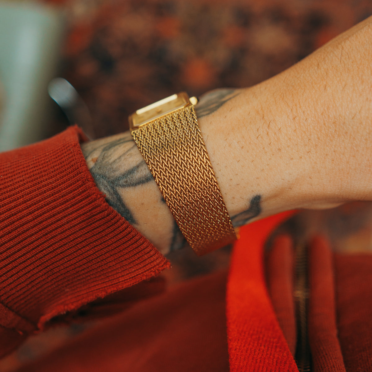 Citizen Woven Sauce rectangular quartz watch face on wrist