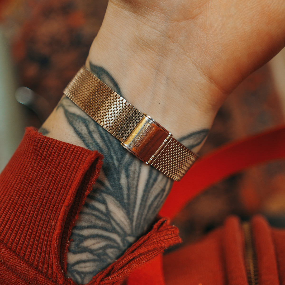 Citizen Exceed coffee-toned case and sparkle dial on wrist