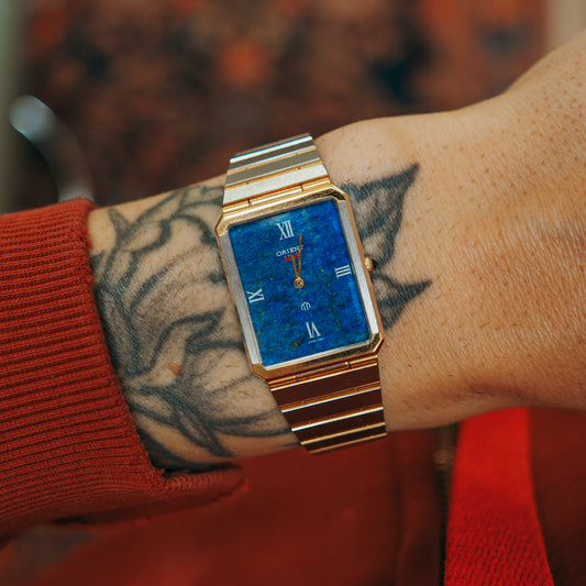 Orient Two Tone Lapis Dial bracelet on wrist