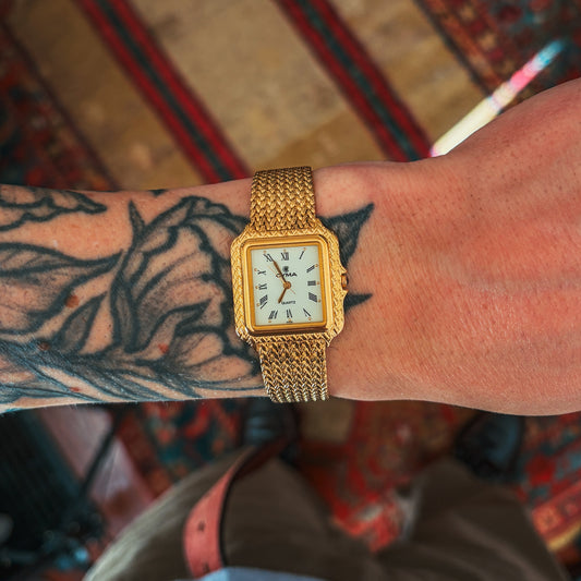 CYMA Quartz Tank gold dial on wrist