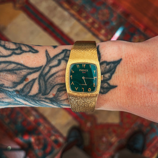 Phinix Swiss Mechanical green malachite dial on wrist