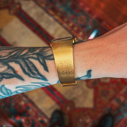 Phinix Swiss Mechanical gold bracelet side profile on wrist