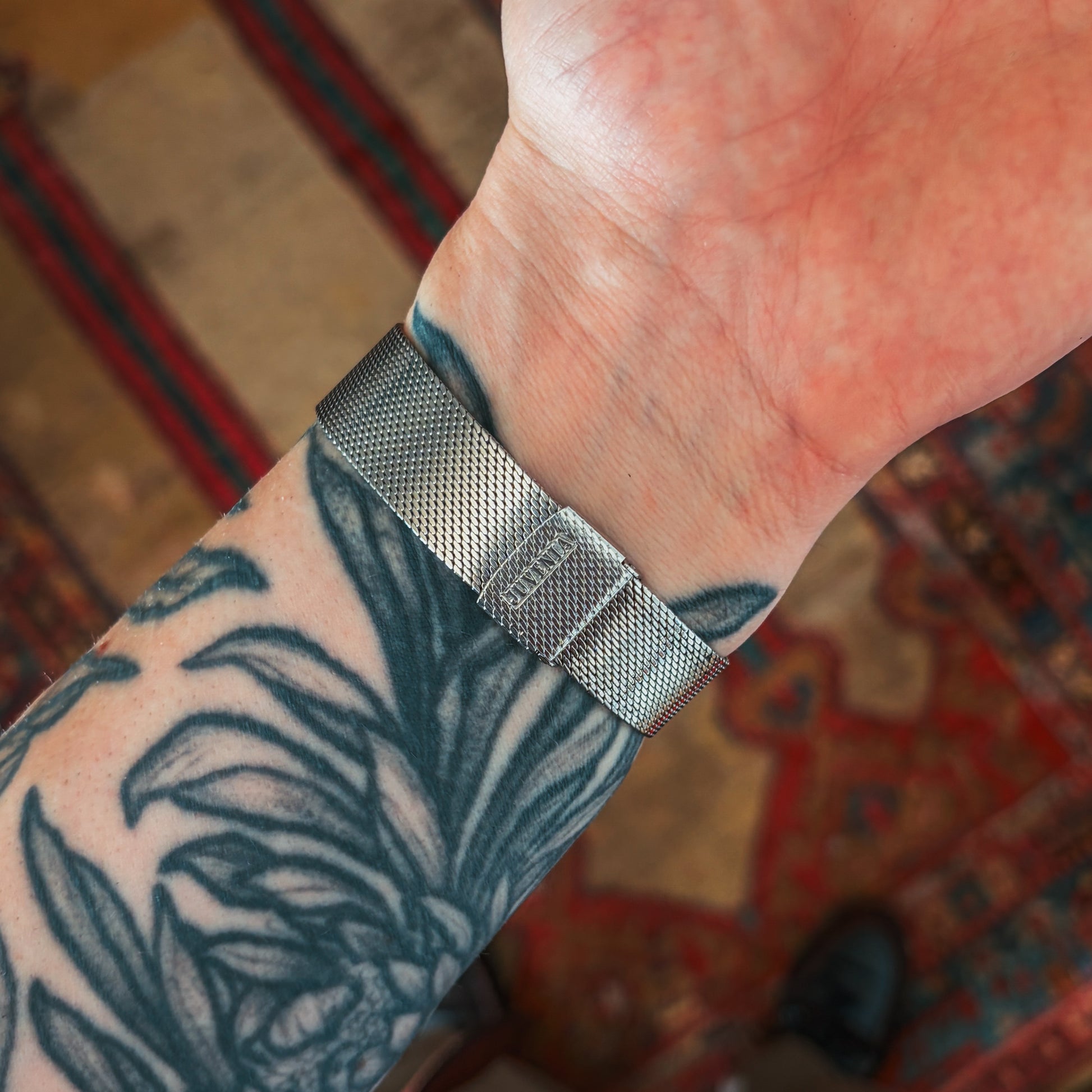 Juvenia Swiss Mechanical silver mesh bracelet clasp detail