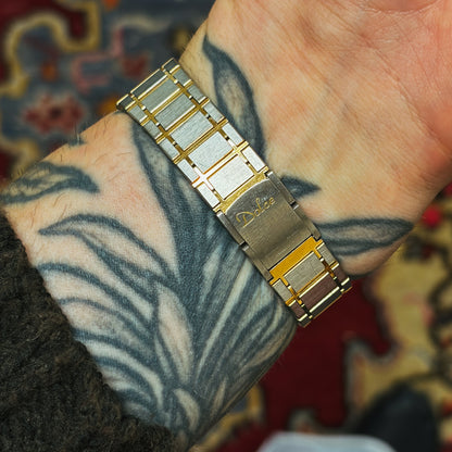 Two-tone Seiko Dolce watch with handmade red, blue and black nebula dial