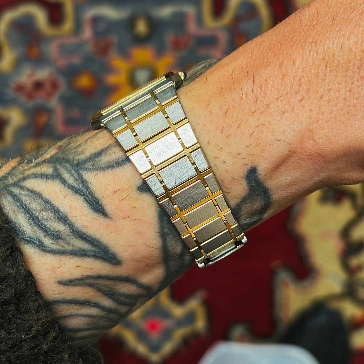 Two-tone Seiko Dolce bracelet shown on wrist