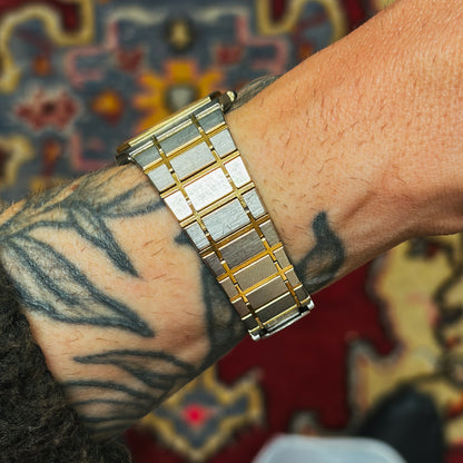 Two-tone Seiko Dolce bracelet shown on wrist